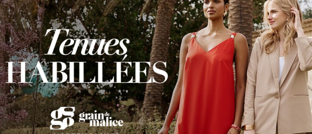 Deux femmes portent des tenues habillées élégantes Grain de Malice, dont une robe rouge fluide et un tailleur beige, au Centre Commercial E.Leclerc Le Méridien à Ibos.