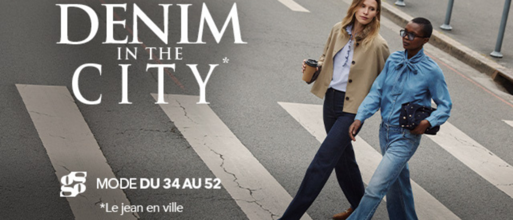 Deux femmes portent des looks en denim dans un décor urbain, avec le message « Denim in the City » et une collection mode disponible du 34 au 52.